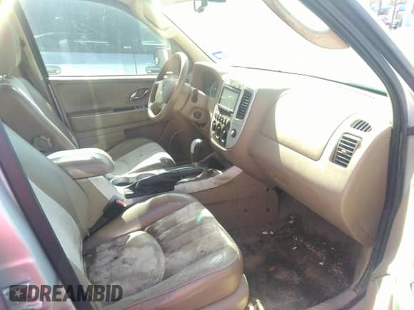 2007 Mercury Mariner Premier with VIN 4M2CU97107KJ08843, listed as a IAAI auction lot 41748968 with 194,183 mi miles and . Bid and sale history available at DreamBid. Image 5.