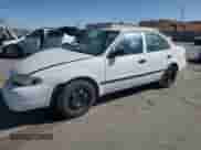 2001 Chevrolet Prizm z VIN 1Y1SK52821Z400217, wystawiony jako Copart lot #51088835 z przebiegiem 87 346 mil mil oraz Szkoda całkowita • Salvage title. Historia ofert i sprzedaży dostępna na DreamBid. Obrazek 1.