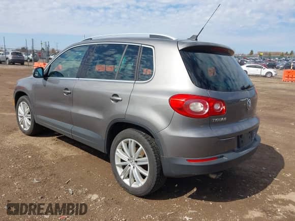2011 Volkswagen Tiguan S with VIN WVGBV7AX2BW533378, listed as a IAAI auction lot 41922023 with 110,452 mi miles and . Bid and sale history available at DreamBid. Image 3.