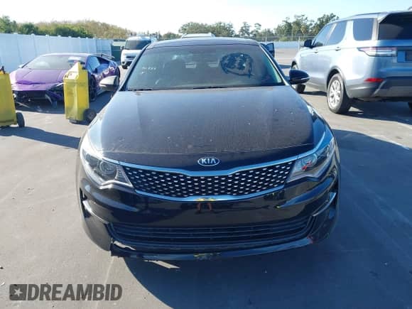 2016 Kia Optima EX with VIN 5XXGU4L33GG053915, listed as a IAAI auction lot 43540697 with 98,283 mi miles and . Bid and sale history available at DreamBid. Image 12.