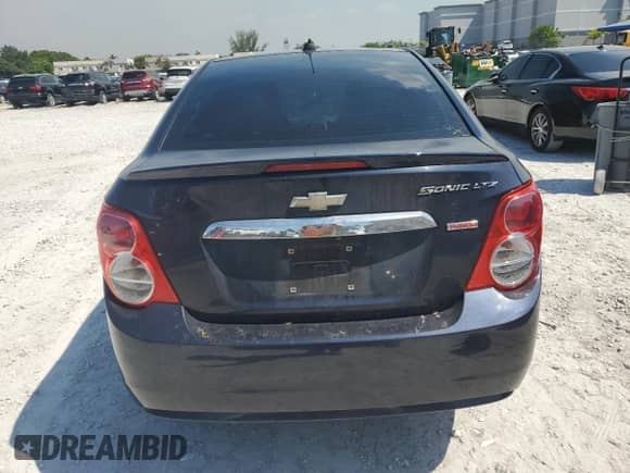 2016 Chevrolet Sonic LTZ with VIN 1G1JE5SB8G4143470, listed as a Copart auction lot 69907775 with 149,020 mi miles and Salvage title. Bid and sale history available at DreamBid. Image 6.