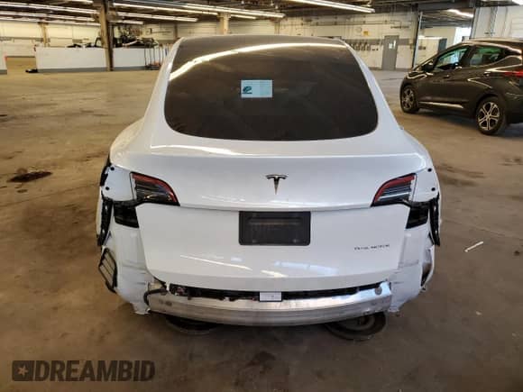 2021 Tesla Model Y Long Range with VIN 5YJYGDEE4MF247958, listed as a Copart auction lot 59464124 with 25,104 mi miles and Salvage title. Bid and sale history available at DreamBid. Image 6.