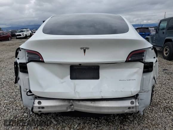 2023 Tesla Model Y Long Range с VIN 7SAYGAEE9PF584339, выставлен на аукционе Copart как лот 56988655 с пробегом Не указан миль и Списание • Salvage title. История ставок и продаж доступна на DreamBid. Изображение 6.