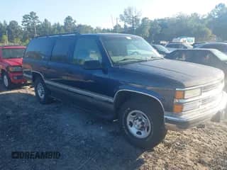 1999 Chevrolet Suburban with VIN 3GNGC26J2XG214745, listed as a IAAI auction lot 43181883 with 282,510 mi miles and . Bid and sale history available at DreamBid. Image 1.