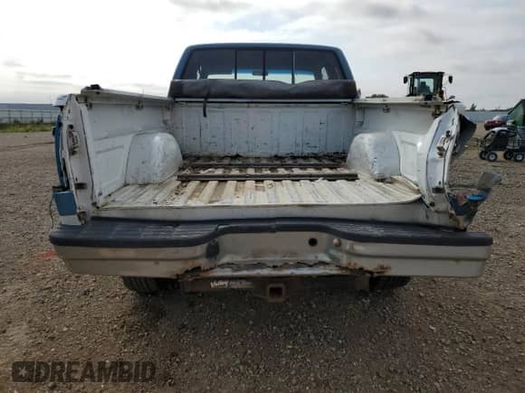 1991 GMC Sierra 1500 SLT z VIN 2GTEK19Z4M1542137, wystawiony jako Copart lot #68024074 z przebiegiem 347 281 mil mil oraz Szkoda całkowita • Salvage title. Historia ofert i sprzedaży dostępna na DreamBid. Obrazek 6.