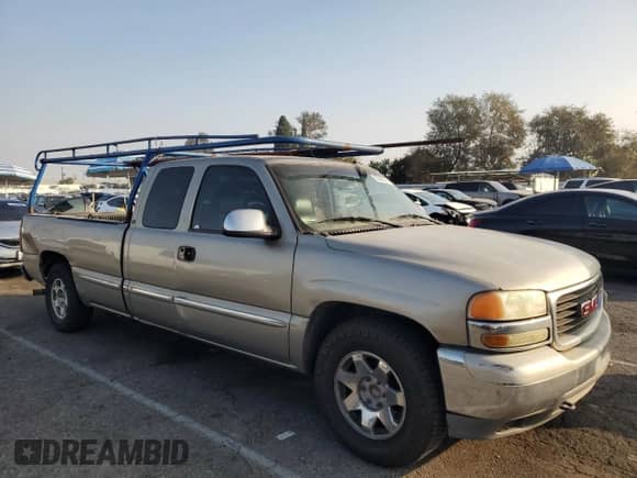 2002 GMC Sierra 1500 SLE с VIN 1GTEC19T32E124432, выставлен на аукционе Copart как лот 83583374 с пробегом Не указан миль и Списание • Salvage title. История ставок и продаж доступна на DreamBid. Изображение 4.