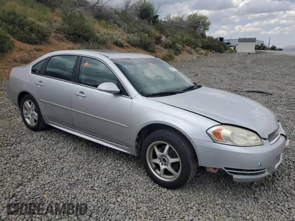 2014 Chevrolet Impala LT with VIN 2G1WB5E38E1133789, listed as a Copart auction lot 59295225 with 176,754 mi miles and Salvage title. Bid and sale history available at DreamBid. Image 4.