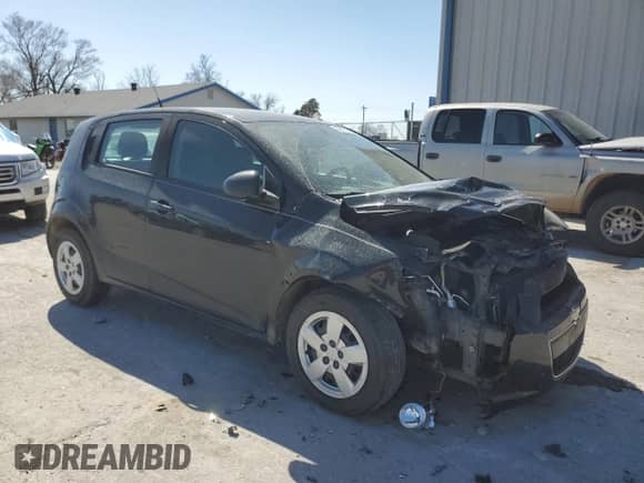 2014 Chevrolet Sonic LS with VIN 1G1JA6SH5E4208245, listed as a Copart auction lot 48719265 with 149,443 mi miles and Salvage title. Bid and sale history available at DreamBid. Image 4.