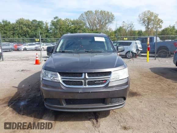 2017 Dodge Journey SE with VIN 3C4PDCABXHT560045, listed as a IAAI auction lot 43332641 with 159,859 mi miles and . Bid and sale history available at DreamBid. Image 11.