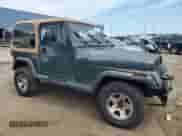 1994 Jeep Wrangler Sahara with VIN 1J4FY49S3RP422650, listed as a Copart auction lot 62353214 with 146,348 mi miles and Clean title. Bid and sale history available at DreamBid. Image 4.