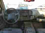 1996 Chevrolet Tahoe z VIN 1GNEK13R1TJ385350, wystawiony jako Copart lot #77593884 z przebiegiem 169 178 mil mil oraz Szkoda całkowita • Salvage title. Historia ofert i sprzedaży dostępna na DreamBid. Obrazek 8.