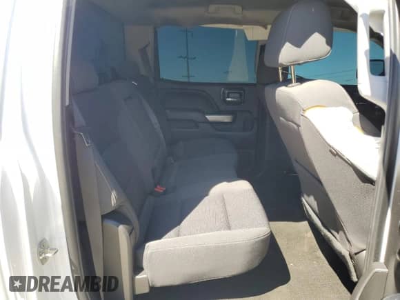 2018 Chevrolet Silverado 1500 LT z VIN 3GCPCREC6JG219622, wystawiony jako Copart lot #71934105 z przebiegiem 74 578 mil mil oraz Szkoda całkowita • Salvage title. Historia ofert i sprzedaży dostępna na DreamBid. Obrazek 10.