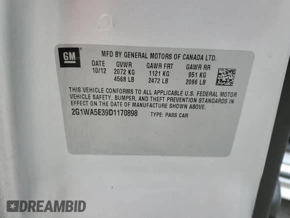 2013 Chevrolet Impala LS z VIN 2G1WA5E39D1170898, wystawiony jako Copart lot #87435755 z przebiegiem 102 562 mil mil oraz Szkoda całkowita • Salvage title. Historia ofert i sprzedaży dostępna na DreamBid. Obrazek 13.