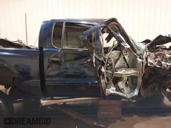 2004 Dodge Dakota Sport with VIN 1D7HG38N44S615599, listed as a IAAI auction lot 41821822 with Not provided miles and . Bid and sale history available at DreamBid. Image 13.