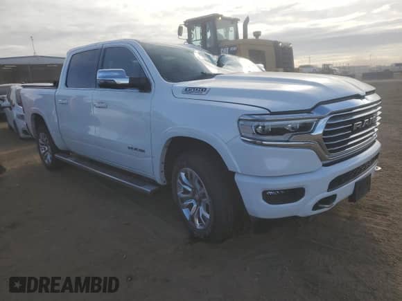 2023 Ram 1500 Longhorn with VIN 1C6SRFKT6PN512147, listed as a Copart auction lot 85702554 with 2,208 mi miles and Salvage title. Bid and sale history available at DreamBid. Image 4.