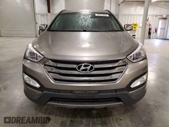 2014 Hyundai Santa Fe с VIN 5XYZUDLB2EG211699, выставлен на аукционе Copart как лот 82019645 с пробегом 174 567 миль миль и Чистый • Clean title. История ставок и продаж доступна на DreamBid. Изображение 5.