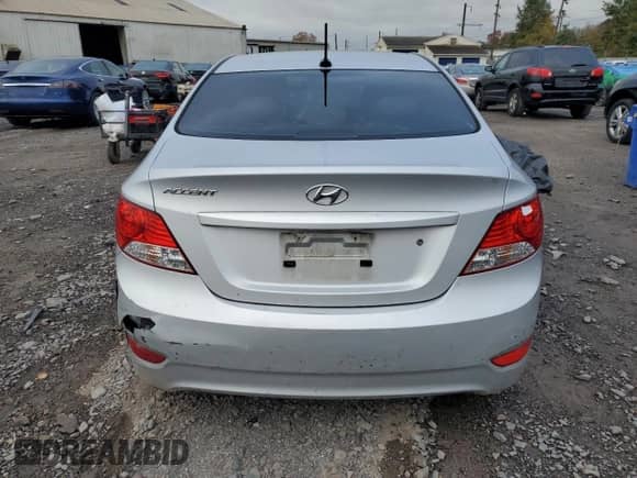 2012 Hyundai Accent GLS z VIN KMHCU4AE1CU234062, wystawiony jako Copart lot #87417015 z przebiegiem Nie podano mil oraz Szkoda całkowita • Salvage title. Historia ofert i sprzedaży dostępna na DreamBid. Obrazek 6.