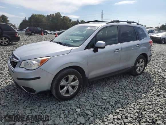 2014 Subaru Forester Limited z VIN JF2SJAHC7EH424473, wystawiony jako Copart lot #71002205 z przebiegiem 128 976 mil mil oraz Szkoda całkowita • Salvage title. Historia ofert i sprzedaży dostępna na DreamBid. Obrazek 1.