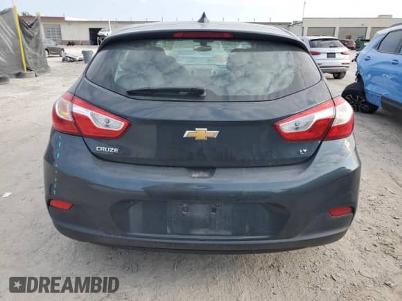 2017 Chevrolet Cruze LT с VIN 3G1BE6SM4HS566463, выставлен на аукционе Copart как лот 68772525 с пробегом 166 842 миль миль и Списание • Salvage title. История ставок и продаж доступна на DreamBid. Изображение 6.