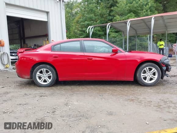 2015 Dodge Charger SE with VIN 2C3CDXBG5FH812391, listed as a IAAI auction lot 43196303 with 99,372 mi miles and . Bid and sale history available at DreamBid. Image 14.
