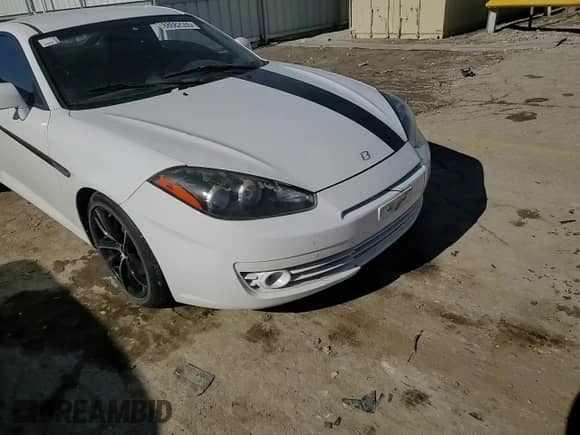 2008 Hyundai Tiburon GT z VIN KMHHN66F98U286353, wystawiony jako Copart lot #88682555 z przebiegiem 174 136 mil mil oraz Szkoda całkowita • Salvage title. Historia ofert i sprzedaży dostępna na DreamBid. Obrazek 10.