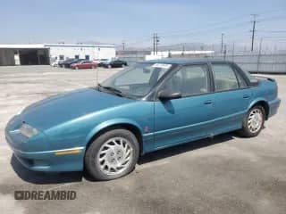 1994 Saturn SL с VIN 1G8ZK5571RZ301061, выставлен на аукционе Copart как лот 55270685 с пробегом 31 990 миль миль и Чистый • Clean title. История ставок и продаж доступна на DreamBid. Изображение 1.