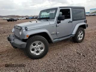 2014 Jeep Wrangler Sahara z VIN 1C4AJWBG5EL221498, wystawiony jako Copart lot #69698425 z przebiegiem 43 821 mil mil oraz Szkoda całkowita • Salvage title. Historia ofert i sprzedaży dostępna na DreamBid. Obrazek 1.