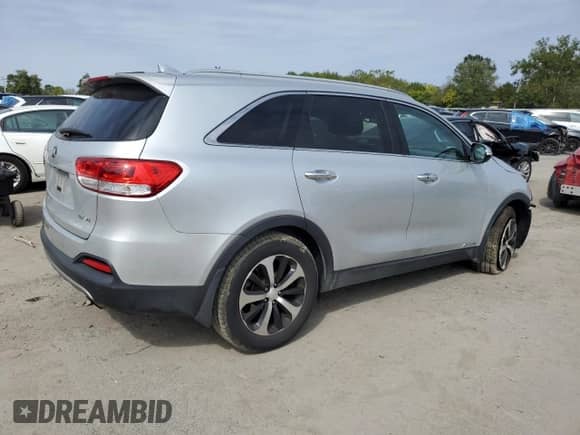 2016 Kia Sorento EX z VIN 5XYPHDA55GG008916, wystawiony jako Copart lot #81569785 z przebiegiem Nie podano mil oraz Szkoda całkowita • Salvage title. Historia ofert i sprzedaży dostępna na DreamBid. Obrazek 3.