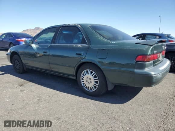 1999 Toyota Camry LE z VIN JT2BG28KXX0359137, wystawiony jako Copart lot #85011045 z przebiegiem 158 951 mil mil oraz Czysty tytuł • Clean title. Historia ofert i sprzedaży dostępna na DreamBid. Obrazek 2.