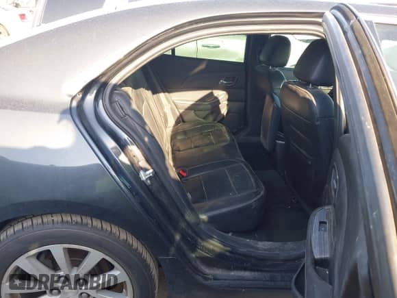 2014 Chevrolet Malibu LTZ with VIN 1G11H5SL4EF209370, listed as a IAAI auction lot 43001036 with 173,102 mi miles and . Bid and sale history available at DreamBid. Image 8.