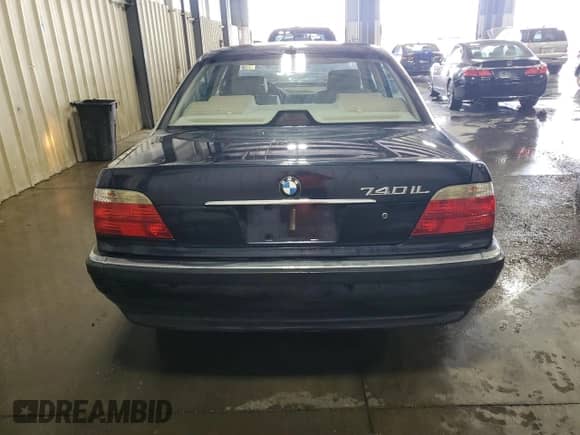 2001 BMW 7 Series 740iL with VIN WBAGH834X1DP22703, listed as a Copart auction lot 70205585 with 121,569 mi miles and Salvage title. Bid and sale history available at DreamBid. Image 6.
