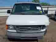 2003 Ford Econoline Cargo with VIN 1FTNE24L93HC07550, listed as a IAAI auction lot 42146707 with 227,224 mi miles and . Bid and sale history available at DreamBid. Image 12.