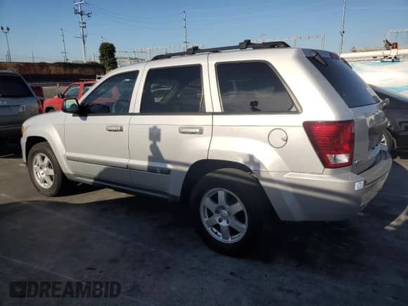 2009 Jeep Grand Cherokee Laredo with VIN 1J8GS48K79C528175, listed as a Copart auction lot 69396065 with 97,409 mi miles and Clean title. Bid and sale history available at DreamBid. Image 2.
