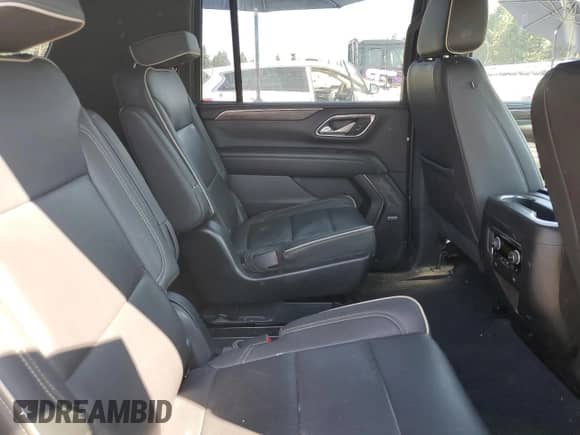 2023 Chevrolet Suburban Premier с VIN 1GNSKFKD5PR209933, выставлен на аукционе Copart как лот 65276405 с пробегом 81 275 миль миль и Списание • Salvage title. История ставок и продаж доступна на DreamBid. Изображение 10.