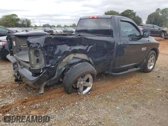 2015 Ram 1500 Express with VIN 3C6JR6AGXFG687427, listed as a Copart auction lot 71589164 with 116,581 mi miles and Salvage title. Bid and sale history available at DreamBid. Image 3.
