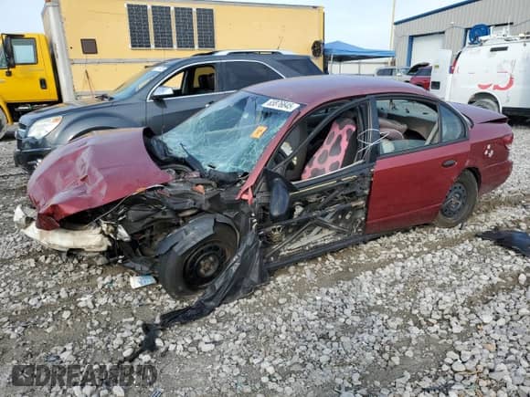 2000 Saturn SL with VIN 1G8ZH5282YZ243696, listed as a Copart auction lot 65876645 with Not provided miles and Salvage title. Bid and sale history available at DreamBid. Image 1.