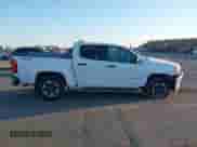 2021 Chevrolet Colorado 4WD Z71 z VIN 1GCGTDEN2M1110856, wystawiony jako IAAI lot #42304561 z przebiegiem 31 155 mil mil oraz . Historia ofert i sprzedaży dostępna na DreamBid. Obrazek 13.