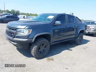 2020 Chevrolet Colorado 4WD ZR2 with VIN 1GCGTEEN3L1131641, listed as a IAAI auction lot 43266982 with 63,695 mi miles and . Bid and sale history available at DreamBid. Image 2.