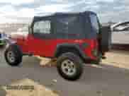 2000 Jeep Wrangler SE with VIN 1J4FA29P4YP798115, listed as a Copart auction lot 80751605 with 119,345 mi miles and Salvage title. Bid and sale history available at DreamBid. Image 2.