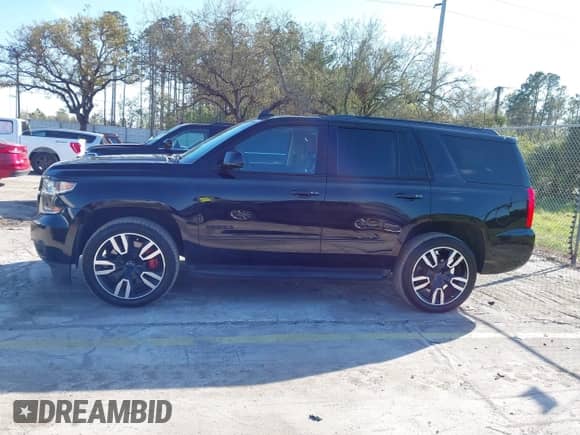 2018 Chevrolet Tahoe Premier with VIN 1GNSKCKJ3JR189371, listed as a IAAI auction lot 41707865 with 112,383 mi miles and . Bid and sale history available at DreamBid. Image 14.