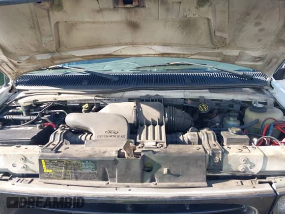 2002 Ford Econoline Cargo with VIN 1FTRE142X2HA95262, listed as a IAAI auction lot 39771693 with 204,642 mi miles and . Bid and sale history available at DreamBid. Image 10.