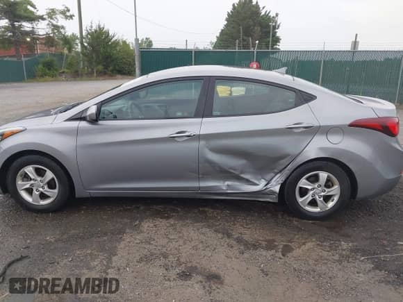 2015 Hyundai Elantra SE z VIN KMHDH4AE6FU291600, wystawiony jako IAAI lot #42850304 z przebiegiem 71 842 mil mil oraz . Historia ofert i sprzedaży dostępna na DreamBid. Obrazek 14.