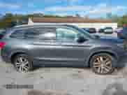 2018 Honda Pilot Elite with VIN 5FNYF6H06JB025867, listed as a IAAI auction lot 43524597 with 94,479 mi miles and . Bid and sale history available at DreamBid. Image 13.