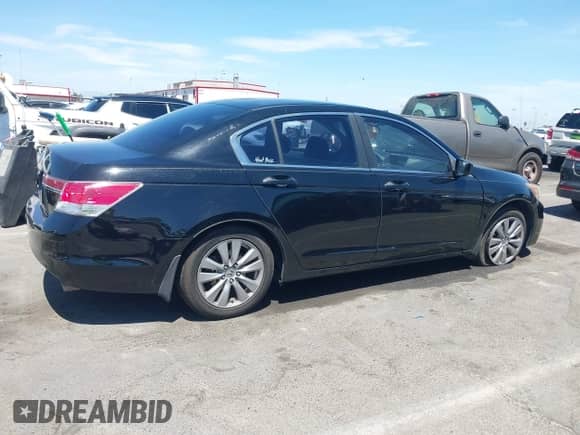 2012 Honda Accord EX z VIN 1HGCP2F71CA069885, wystawiony jako IAAI lot #43035184 z przebiegiem 159 771 mil mil oraz . Historia ofert i sprzedaży dostępna na DreamBid. Obrazek 13.