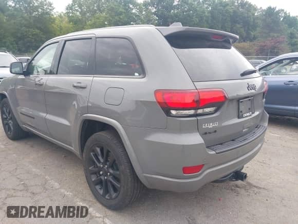 2020 Jeep Grand Cherokee Laredo E with VIN 1C4RJFAG6LC176718, listed as a IAAI auction lot 43043174 with 128,424 mi miles and . Bid and sale history available at DreamBid. Image 3.