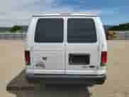 2014 Ford Econoline Cargo Commercial with VIN 1FTNE1EWXEDA22372, listed as a Copart auction lot 52360385 with 128,803 mi miles and Clean title. Bid and sale history available at DreamBid. Image 6.