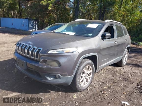 2014 Jeep Cherokee Latitude with VIN 1C4PJMCS5EW294855, listed as a IAAI auction lot 43501954 with 212,720 mi miles and . Bid and sale history available at DreamBid. Image 2.