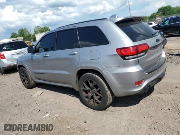 2018 Jeep Grand Cherokee SRT z VIN 1C4RJFDJ2JC508237, wystawiony jako Copart lot #61404555 z przebiegiem 76 990 mil mil oraz Szkoda całkowita • Salvage title. Historia ofert i sprzedaży dostępna na DreamBid. Obrazek 2.