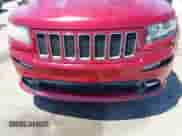 2012 Jeep Grand Cherokee SRT-8 z VIN 1C4RJFDJ9CC120960, wystawiony jako IAAI lot #42713331 z przebiegiem 136 836 mil mil oraz . Historia ofert i sprzedaży dostępna na DreamBid. Obrazek 6.