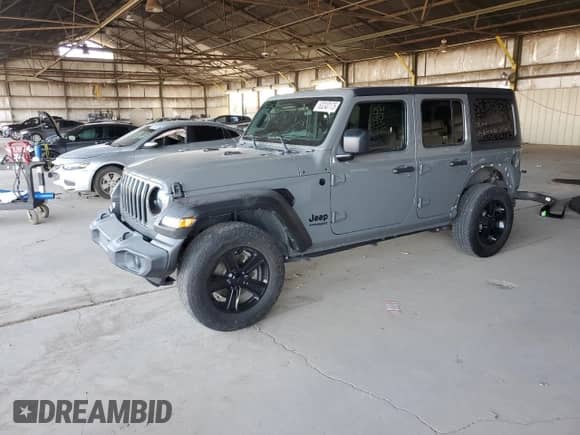 2021 Jeep Wrangler Unlimited 80th Anniversary with VIN 1C4HJXDG2MW595971, listed as a Copart auction lot 63240175 with 52,498 mi miles and Salvage title. Bid and sale history available at DreamBid. Image 1.
